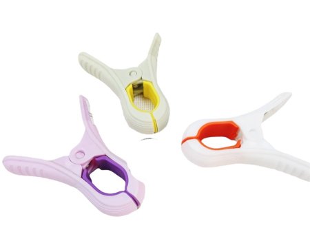 ملقط تثبيت وقص قماش (بلاستيك)